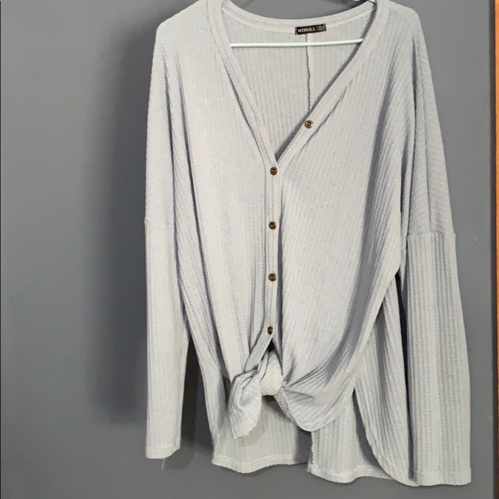 Light blue button v neck tie sweater